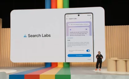 Image of a presentation about Google's Search Generative Experience with a large slide displayed and presenter on stage